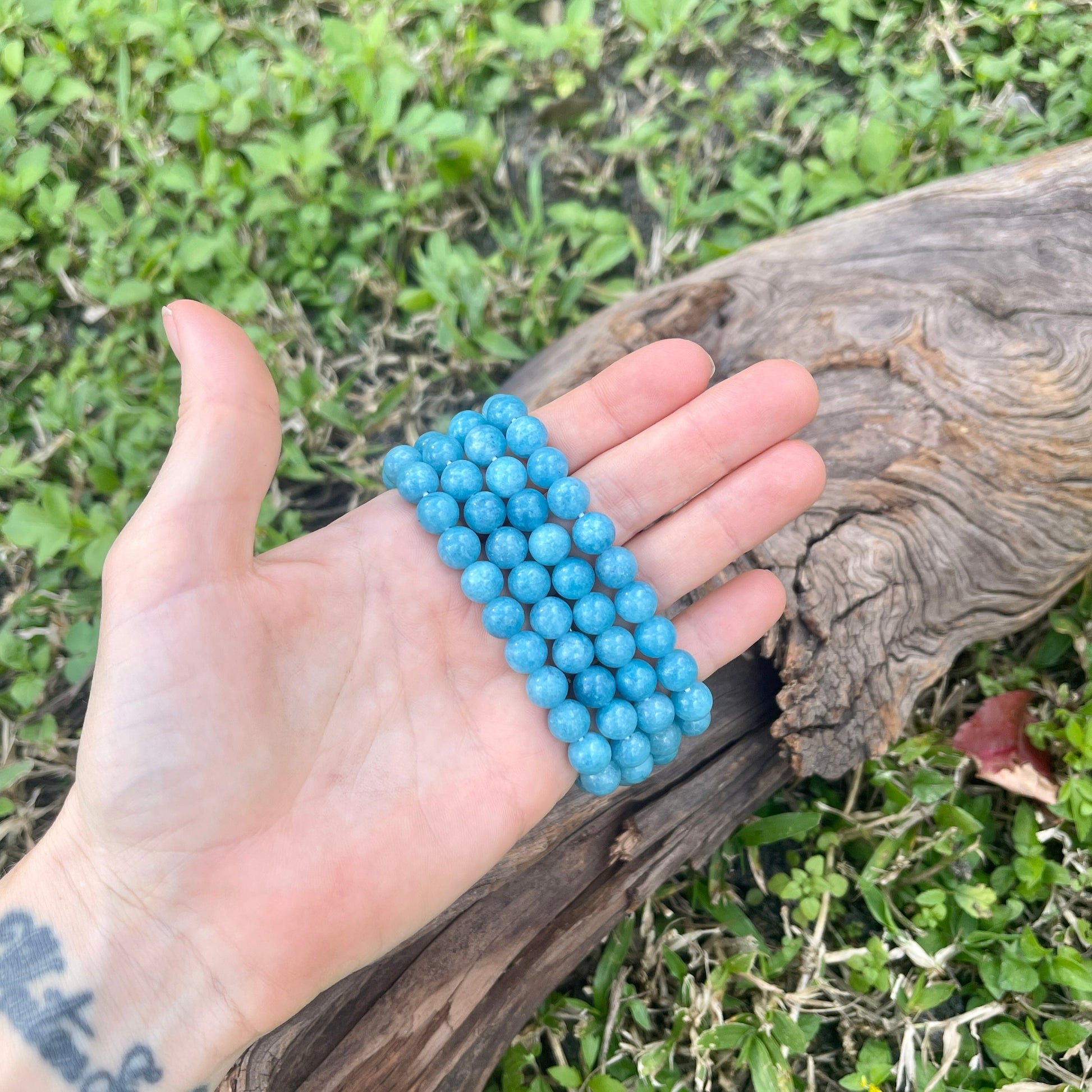blue round smooth bead bracelet
