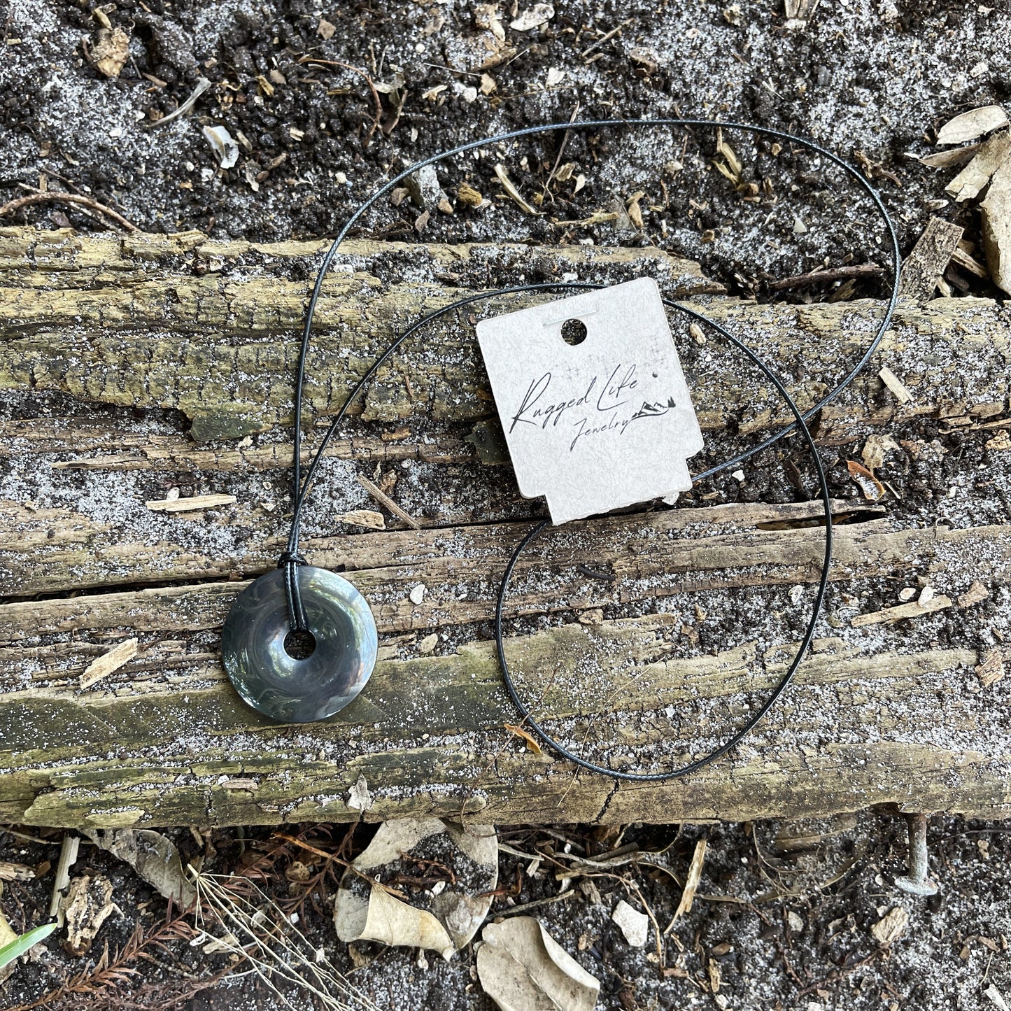 "Break the Spell" Hematite Donut Pendant Cotton Necklace