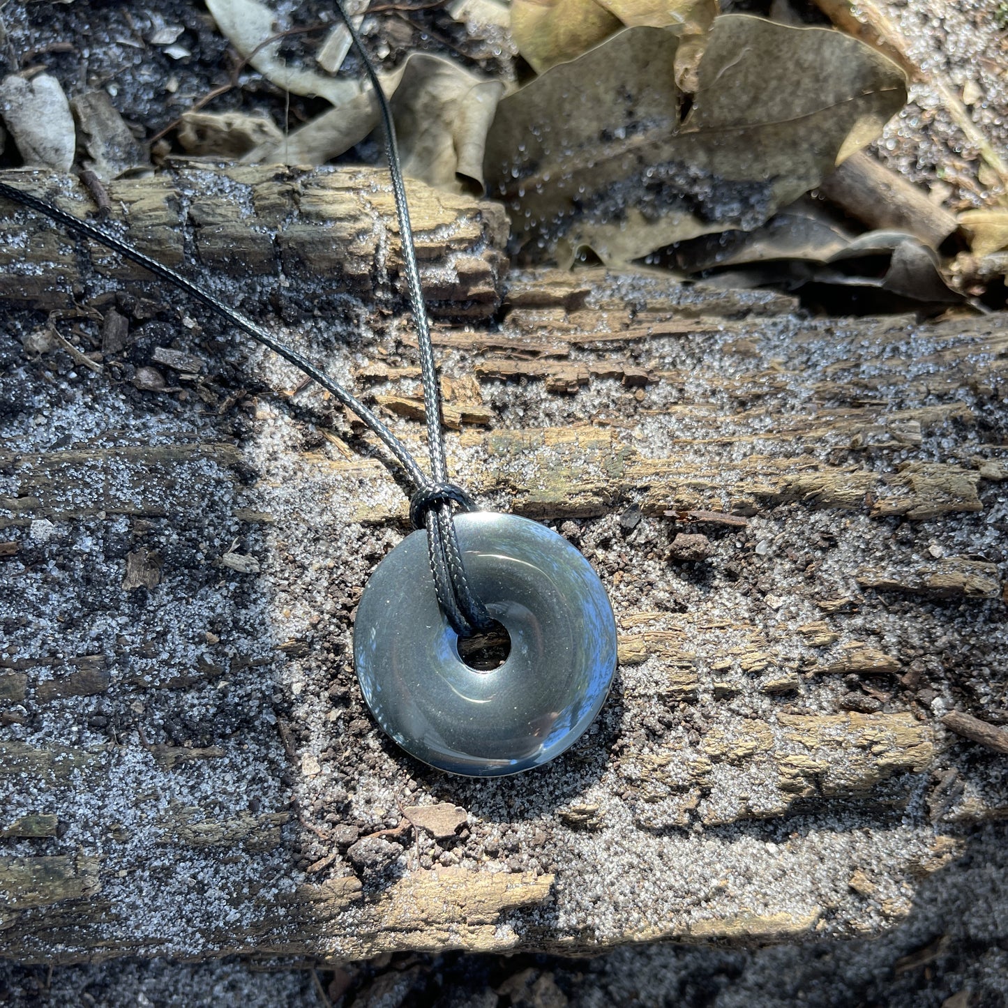 "Break the Spell" Hematite Donut Pendant Cotton Necklace