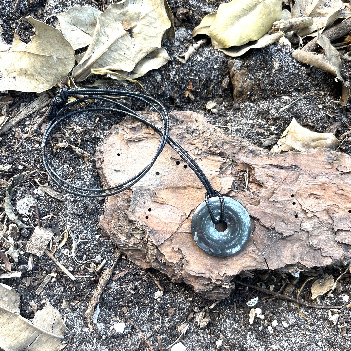 "Break the Spell" Hematite Donut Pendant Cotton Necklace